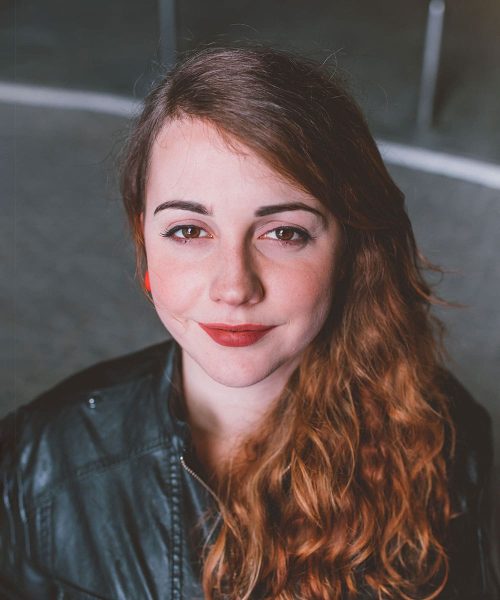 a woman looking at the camera