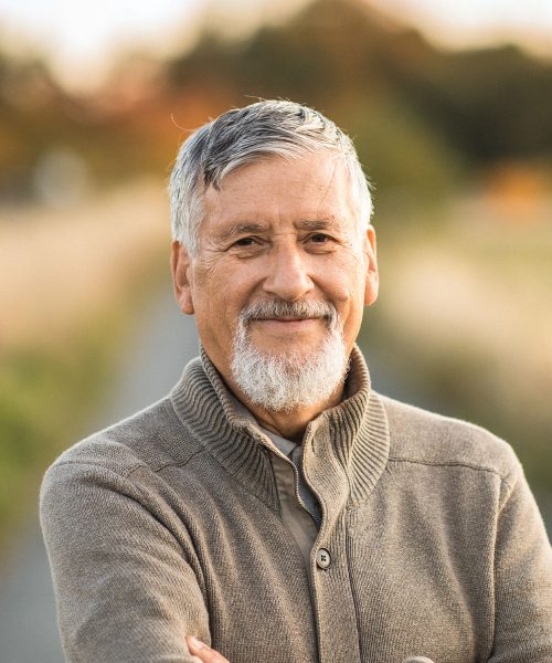 a man smiling for the camera