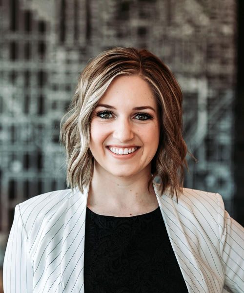 a woman smiling for the camera