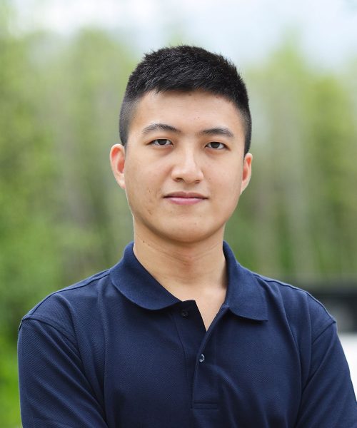 a man wearing a blue shirt