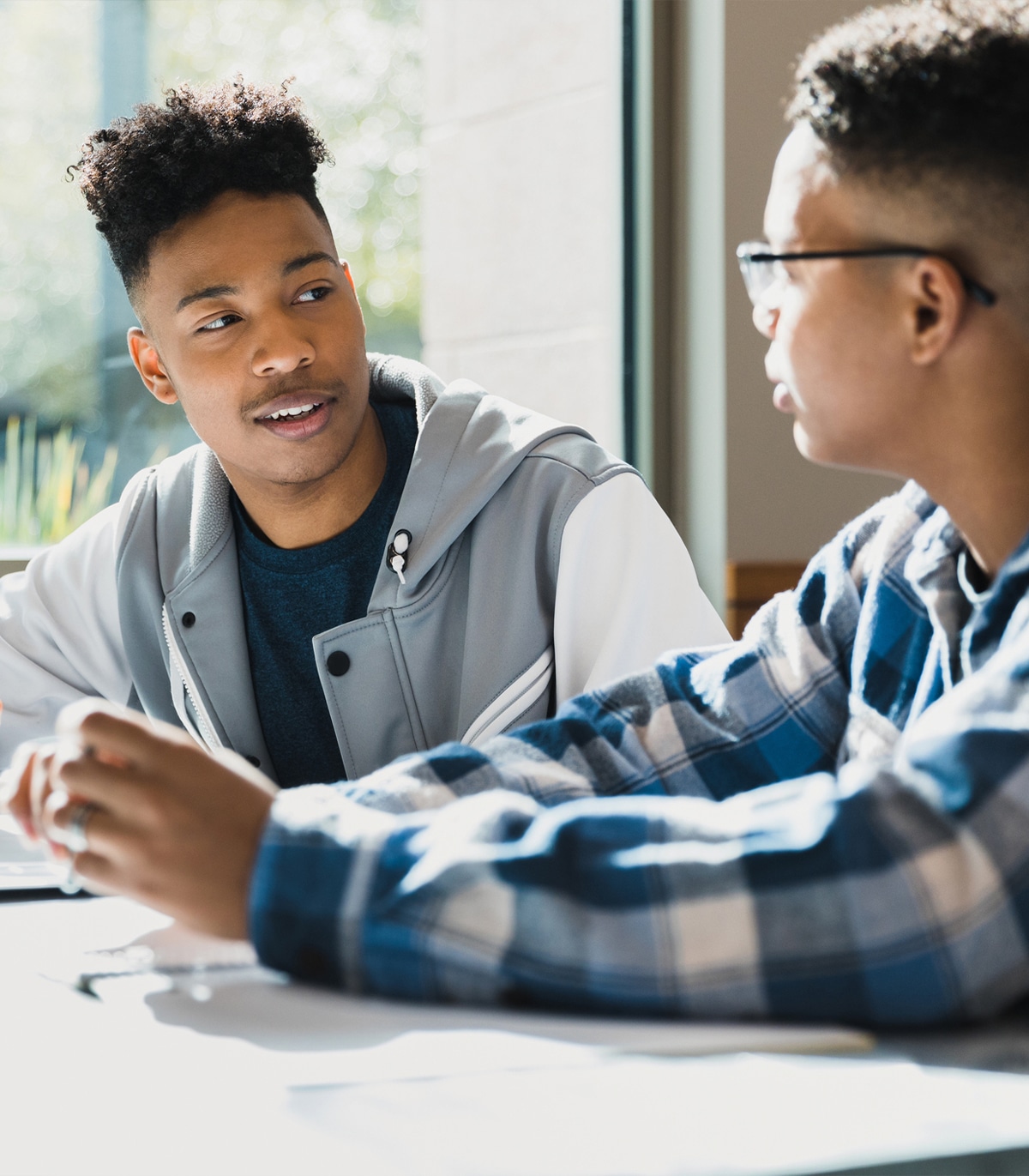 a man and a woman sitting at a table