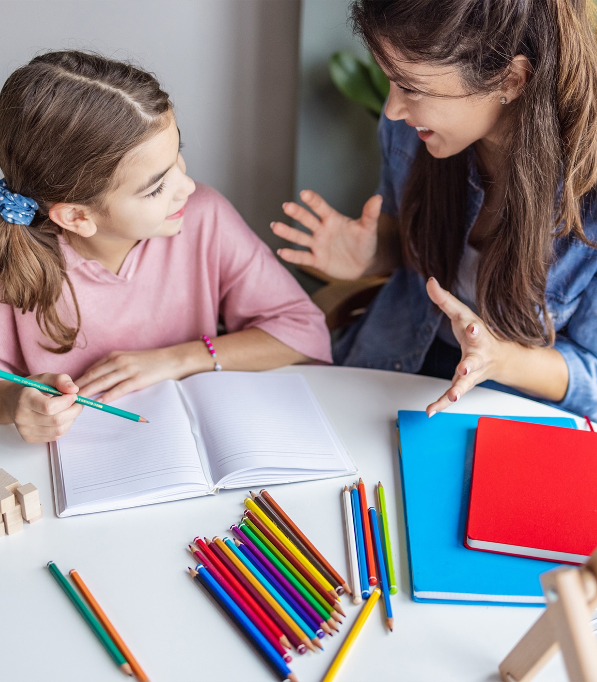 Parent drawing with child